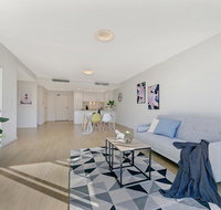 KOZYGURU NORTH RYDE MACQUARIE PARK 2 BEDROOM APT  FREE PARKING NNR009